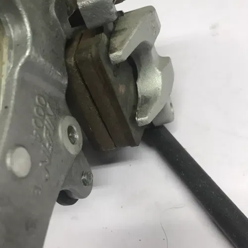 2009 KAWASAKI 06-09 KX250F STAINLESS REAR BACK BRAKE CALIPER MASTER LEVER LINE