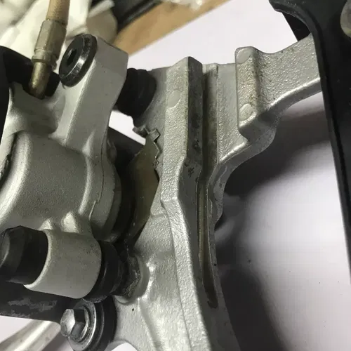 2009 KAWASAKI 06-09 KX250F STAINLESS REAR BACK BRAKE CALIPER MASTER LEVER LINE