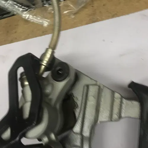 2009 KAWASAKI 06-09 KX250F STAINLESS REAR BACK BRAKE CALIPER MASTER LEVER LINE