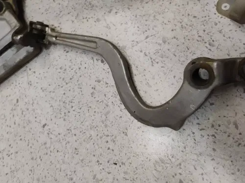 1986 86 KAWASAKI KX 125 250 500 REAR MASTER CYLINDER BRAKE CALIPER MOUNT Lever