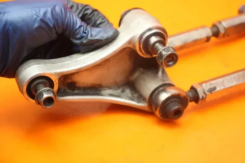 2004 2005 HONDA CBR 1000RR REAR DOGBONE SHOCK LINKAGE LINK 52465-MEL-000