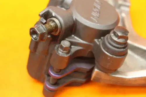 2004 2005 HONDA CBR 1000RR OEM REAR BACK BRAKE CALIPER W MOUNT BRACKET W PADS