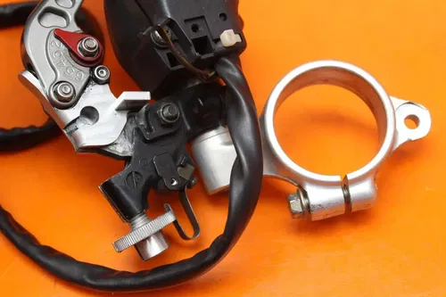 2001 2002 SUZUKI GSXR 1000 OEM LEFT CLIP ON HANDLEBAR W SWITCHES AND CRG LEVER