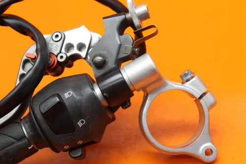 2001 2002 SUZUKI GSXR 1000 OEM LEFT CLIP ON HANDLEBAR W SWITCHES AND CRG LEVER