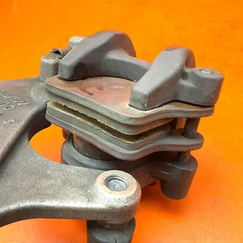2009-2016 SUZUKI GSXR 1000 OEM REAR BACK BRAKE CALIPER & MOUNT BRACKET