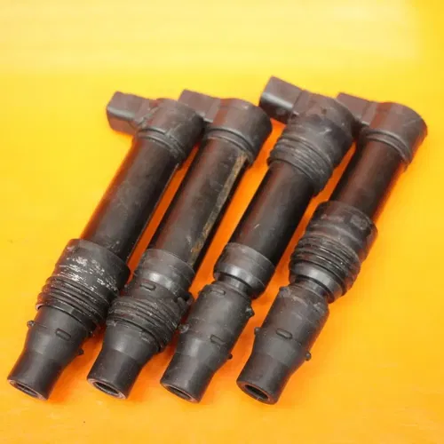 2004-2010 KAWASAKI NINJA ZX10R OEM IGNITION COILS COIL SPARK PLUG CAPS SET