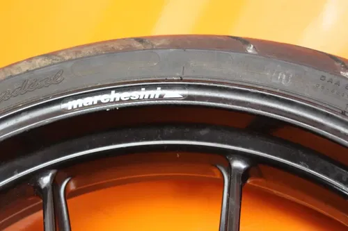 03-06 DUCATI 749 OEM STRAIGHT MARCHESINI FRONT WHEEL RIM W TIRE