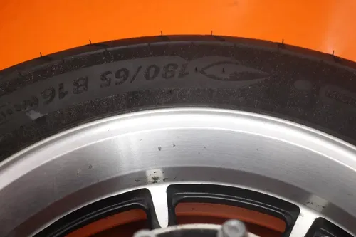 2011 KAWASAKI VULCAN 1700 VOYAGER ABS OEM STRAIGHT REAR WHEEL BACK RIM W TIRE