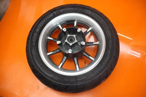 2011 KAWASAKI VULCAN 1700 VOYAGER ABS OEM STRAIGHT REAR WHEEL BACK RIM W TIRE