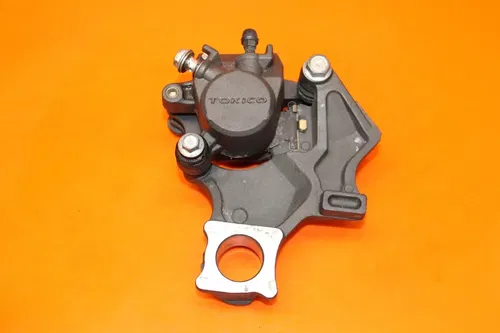 06-07 SUZUKI GSXR 600 750 OEM REAR BRAKE CALIPER W MOUNT BRACKET W PADS