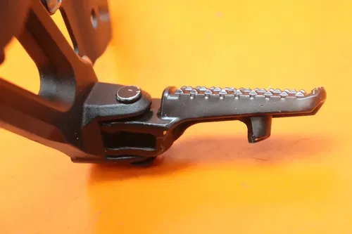 2004-2007 HONDA CBR1000RR OEM LEFT REARSET REAR SET DRIVER FOOT PEG REST STOP