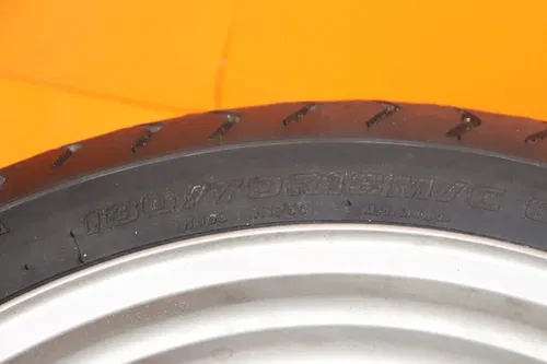2006-2009 SUZUKI BOULEVARD M109R OEM STRAIGHT FRONT WHEEL RIM W TIRE