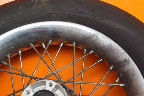 2007 HARLEY-DAVIDSON SOFTAIL DELUXE FLSTN OEM STRAIGHT FRONT WHEEL RIM W TIRE