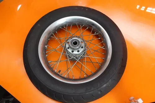2007 HARLEY-DAVIDSON SOFTAIL DELUXE FLSTN OEM STRAIGHT FRONT WHEEL RIM W TIRE