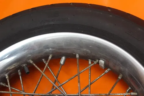 2007 HARLEY-DAVIDSON SOFTAIL DELUXE FLSTN OEM STRAIGHT FRONT WHEEL RIM W TIRE