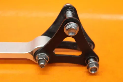 2013 TRIUMPH DAYTONA 675 OEM REAR DOGBONE SHOCK LINKAGE LINK