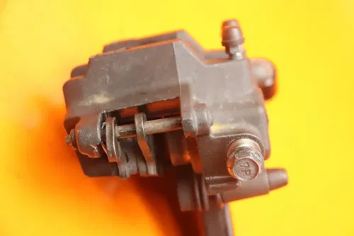 06-09 SUZUKI BOULEVARD M109R OEM REAR BACK BRAKE CALIPER W MOUNT BRACKET