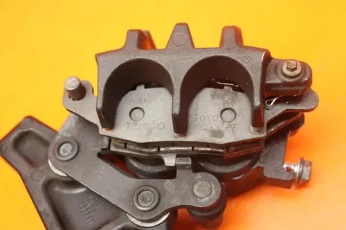 06-09 SUZUKI BOULEVARD M109R OEM REAR BACK BRAKE CALIPER W MOUNT BRACKET