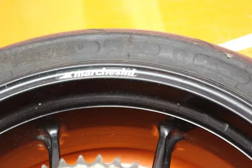03-06 DUCATI 749 OEM STRAIGHT REAR WHEEL BACK RIM W TIRE