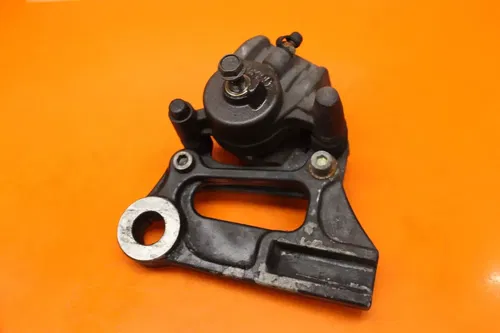 06-10 KAWASAKI NINJA ZX10R OEM REAR BACK BRAKE CALIPER W MOUNT BRACKET