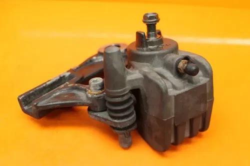 06-10 KAWASAKI NINJA ZX10R OEM REAR BACK BRAKE CALIPER W MOUNT BRACKET