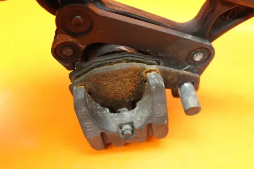06-10 KAWASAKI NINJA ZX10R OEM REAR BACK BRAKE CALIPER W MOUNT BRACKET