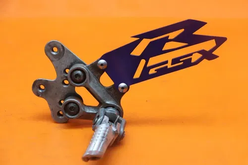 2009-2014 SUZUKI GSXR 1000 OEM LEFT REARSET REAR SET DRIVER FOOT PEG REST STOP
