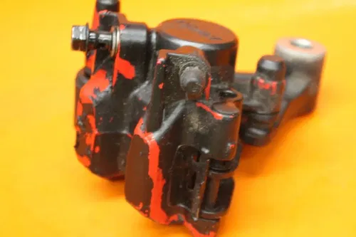 2019 HONDA GROM 125 OEM REAR BACK BRAKE CALIPER W MOUNT BRACKET WITH PADS