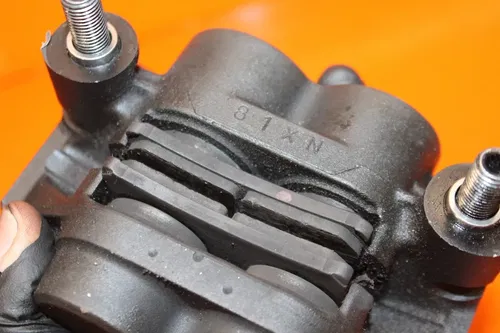 09-15 2009 YAMAHA YZF R6 OEM LEFT FRONT BRAKE CALIPER W PADS