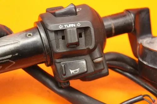 2004 HONDA CBR 1000RR OEM LEFT CLIP ON HANDLEBAR W SWITCHES 35200-MEL-670