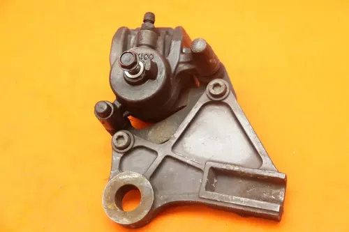 09-10 KAWASAKI ER-6N OEM REAR BACK BRAKE CALIPER W MOUNT BRACKET