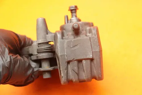 09-10 KAWASAKI ER-6N OEM REAR BACK BRAKE CALIPER W MOUNT BRACKET