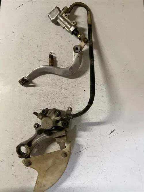2005 Kawasaki kx250f rear brake caliper master hose pedal