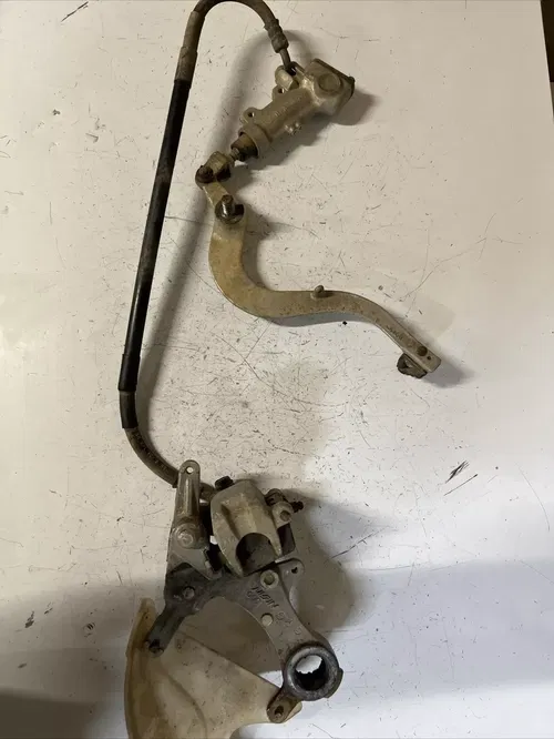 2005 Kawasaki kx250f rear brake caliper master hose pedal