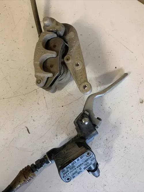 1991 Honda Cr250r front brake caliper hose and master