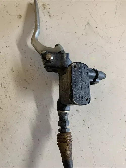 1991 Honda Cr250r front brake caliper hose and master