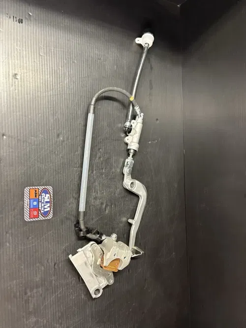 New OEM Kawasaki 85/100/112 Rear Brake Assembly