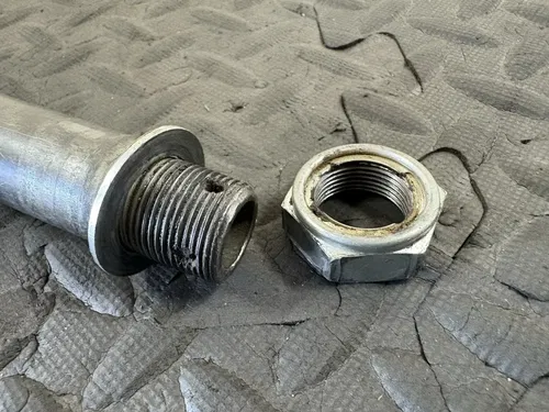 2009 KAWASAKI 04-14 KX450F KX250F OEM REAR AXLE BACK WHEEL PIVOT BOLT 41068-1466