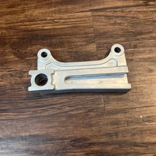 04-13 KX85 KX100 Rear Brake Caliper Carrier Bracket