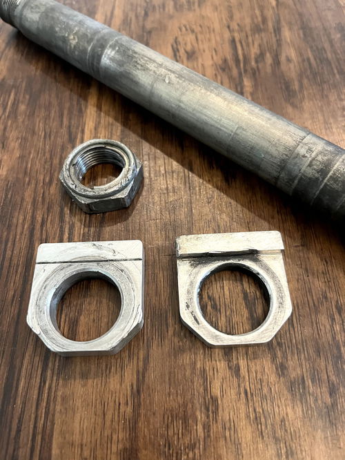 17-23 KX250F KX450F OEM Rear Axle W/ Nut and Adjustment Blocks - 41068-0597