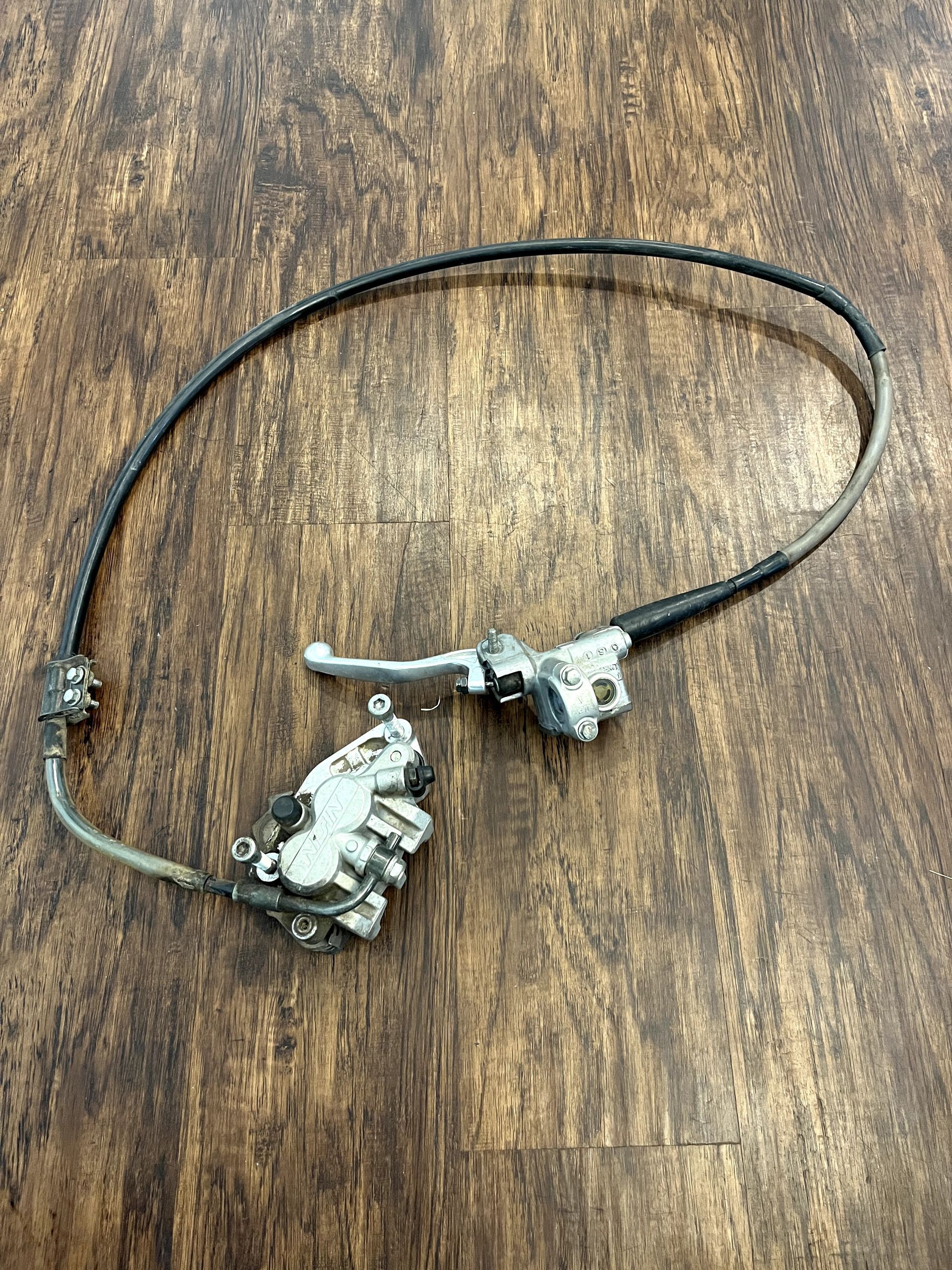 99-02 KX125 KX250 OEM Complete Front Brake Assembly