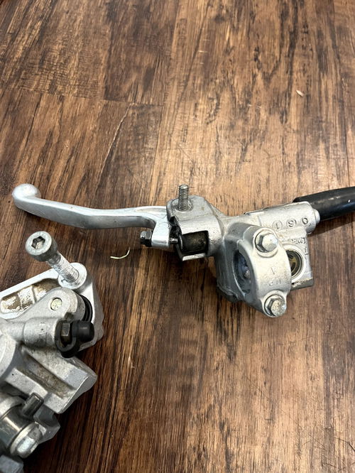 99-02 KX125 KX250 OEM Complete Front Brake Assembly