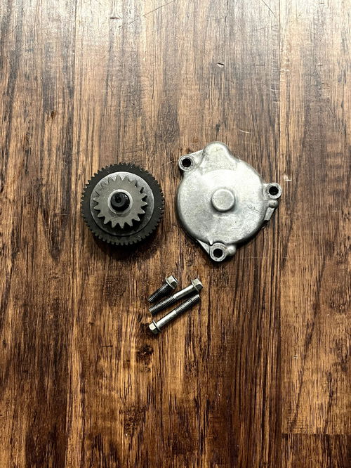 19-24 KX450 OEM Starter Reduction Gear and Cover