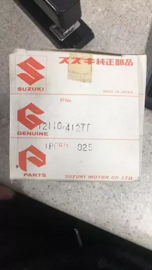 SUZUKI- 12110-41211 PISTON- DOES NOT INCLUDE CIRCLIP OR WRIST PIN-  N.O.S.