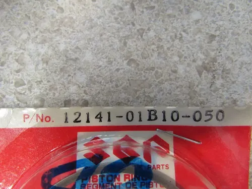 BIN38A- SUZUKI- 12141-01B10-025  PISTON RING  1986- 1991  RM 125 o/s .025mm