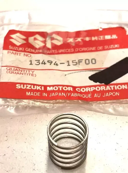 Suzuki Motorcycle OEM NOS Genuine Part NEW Original P/N 13494-15F00 Spring