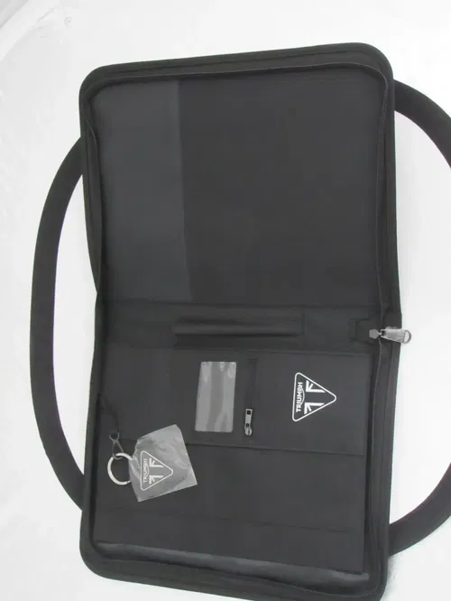 BRAND NEW TRIUMP BINDER