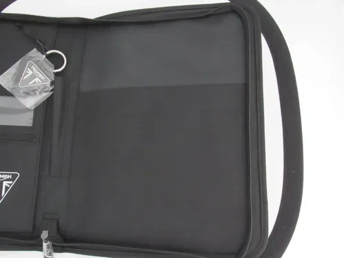 BRAND NEW TRIUMP BINDER