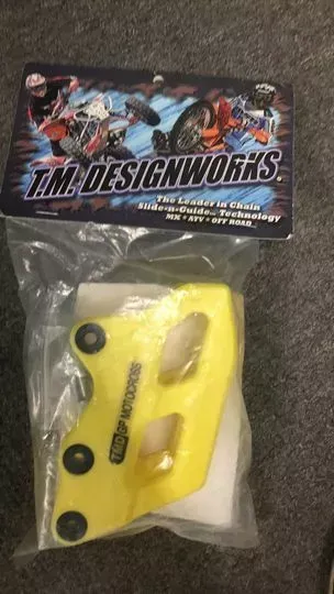 TM DESIGNWORKS - SYCH-GP4-YL - SUZUKI/YAMAHA  "GP" MOTO REAR GUIDE, YELLOW
