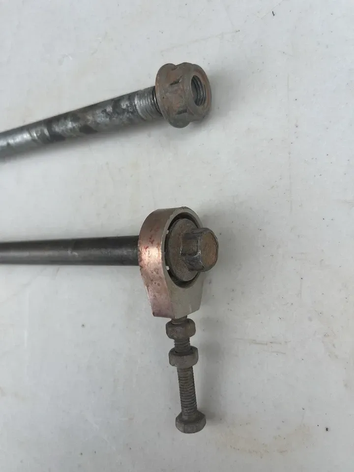   2000 Honda XR80R OEM Front And Rear Axle Bolts Adjusters